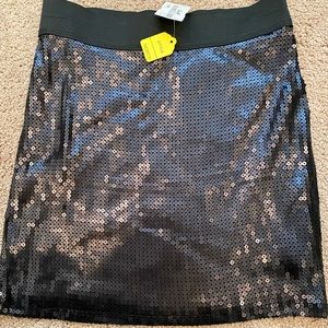 Cute black sequin mini skirt with lots of stretch will fit the body like a glove